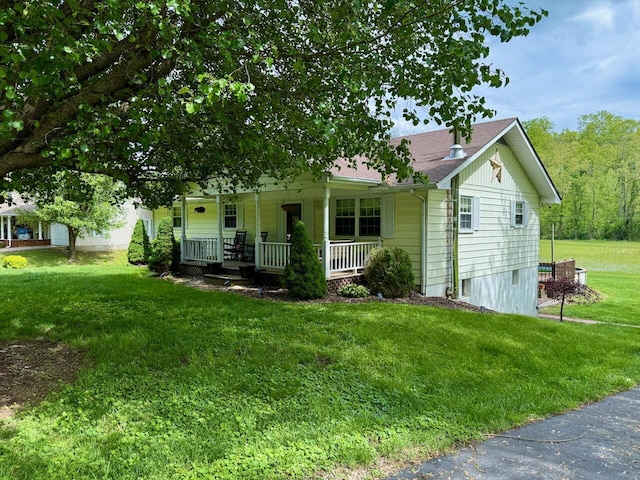 1695 Christy Creek Rd, Morehead, KY 40351 - view of front of property featuring a porch and a front lawn