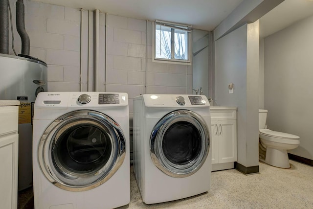 laundry room featuring separate washer and dryer