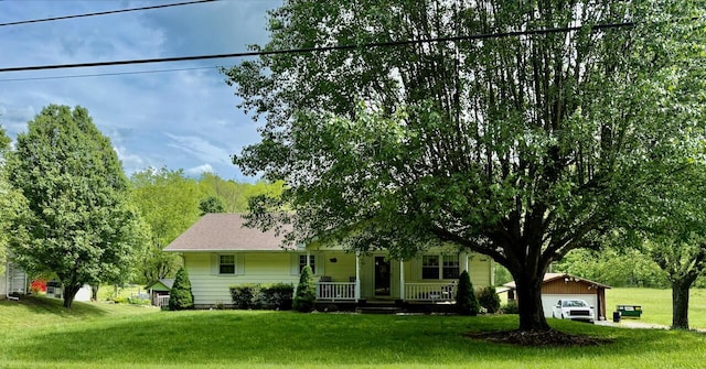 1695 Christy Creek Rd, Morehead, KY 40351 - view of front of property with a porch, a front yard, a garage, and an outdoor structure