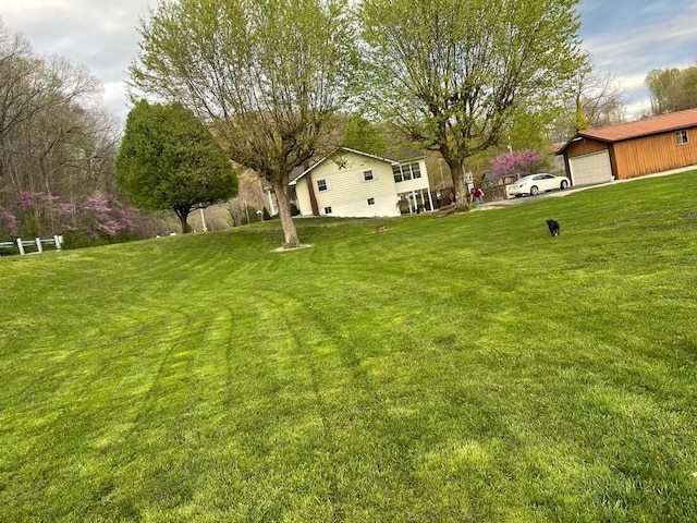 view of yard with a garage