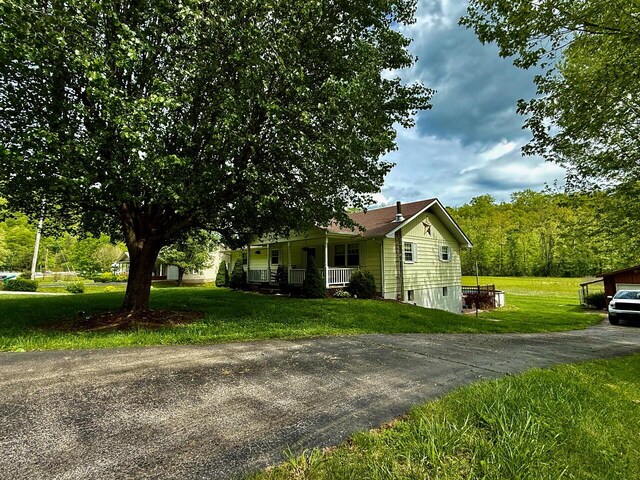 1695 Christy Creek Rd, Morehead, KY 40351 - view of front of property with a front lawn, a porch, and driveway