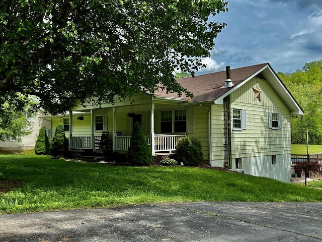 1695 Christy Creek Rd, Morehead, KY 40351 - view of front facade featuring a porch, a front yard, and a shingled roof