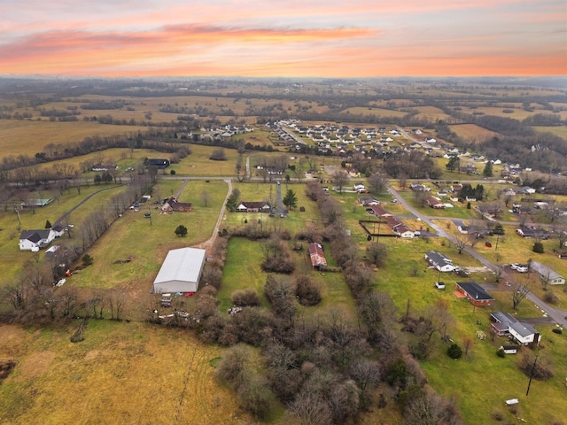 aerial view at dusk with a rural view