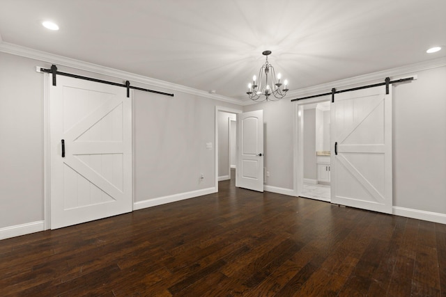 unfurnished bedroom featuring crown molding, a barn door, and dark wood-type flooring