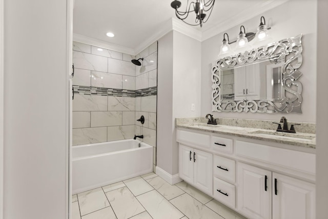 bathroom featuring crown molding, vanity, and tiled shower / bath combo