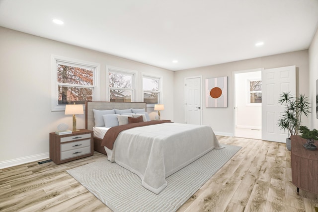 bedroom featuring light wood-type flooring