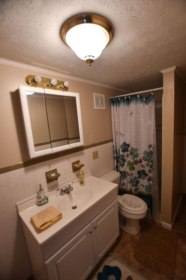 bathroom featuring crown molding, a textured ceiling, tile walls, curtained shower, and hardwood / wood-style flooring