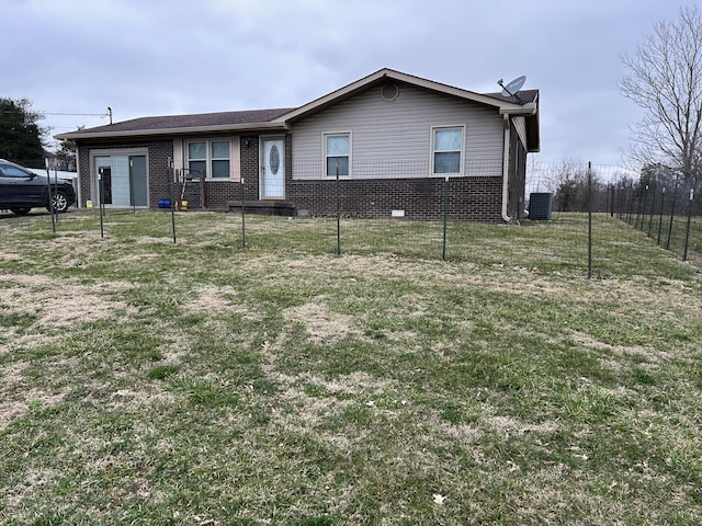 ranch-style house with central air condition unit