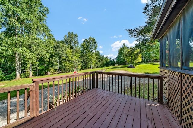 wooden deck with a yard