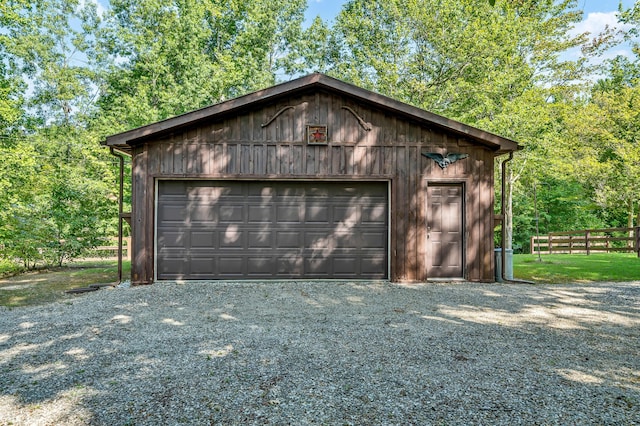 detached garage with fence