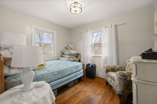 bedroom featuring dark wood-type flooring