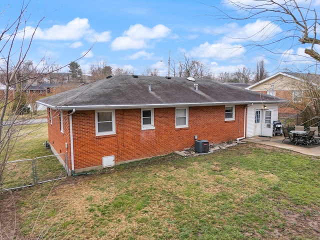 view of property exterior featuring a yard and a patio area