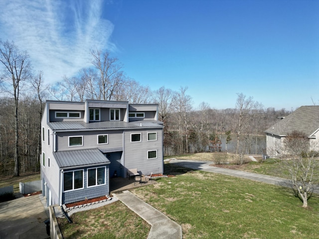 view of front of home with a front yard