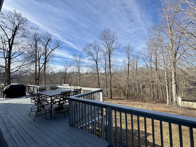 wooden terrace with grilling area