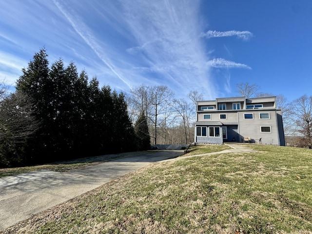 exterior space with a front lawn