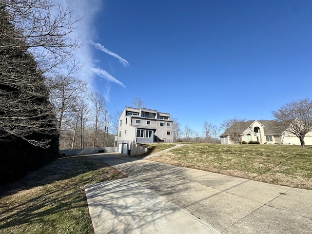 exterior space with a front yard