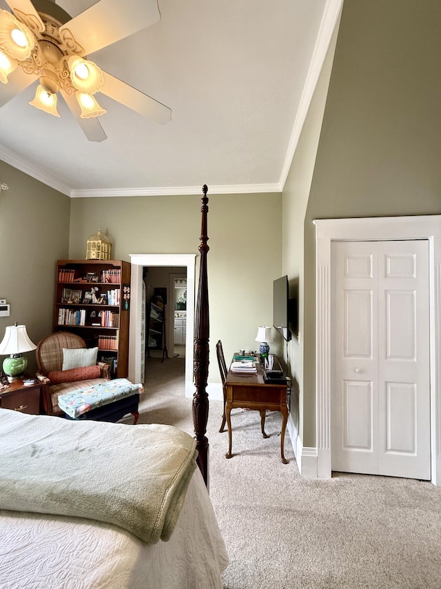 bedroom with carpet floors, ornamental molding, and ceiling fan