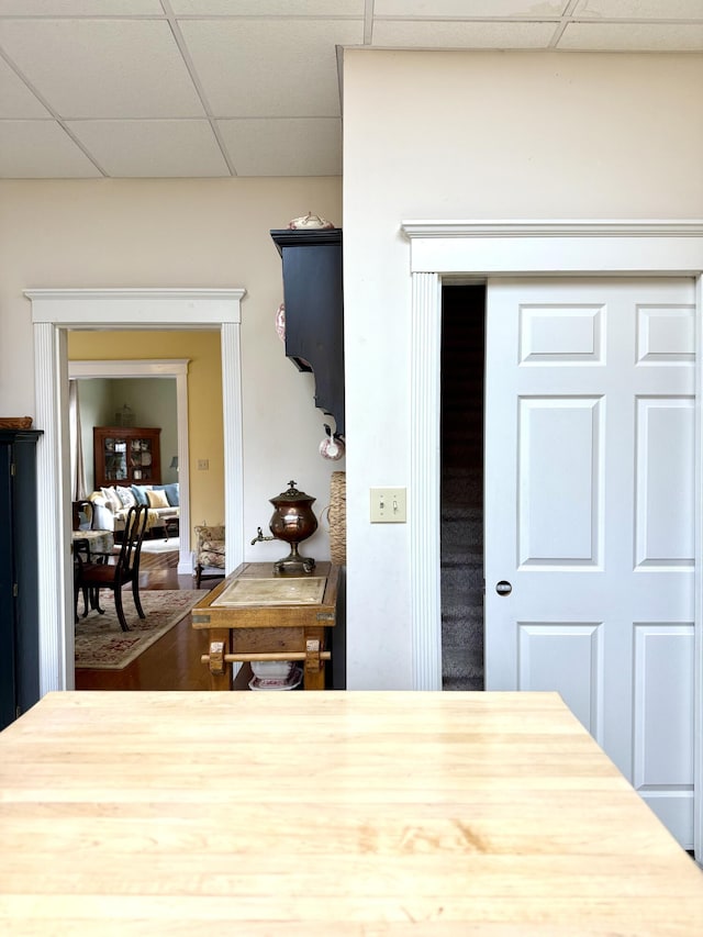 interior space featuring a paneled ceiling