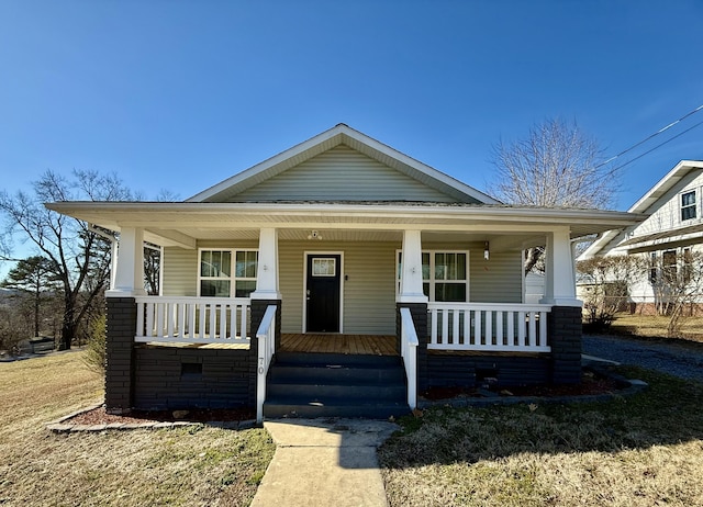 bungalow-style home with a porch