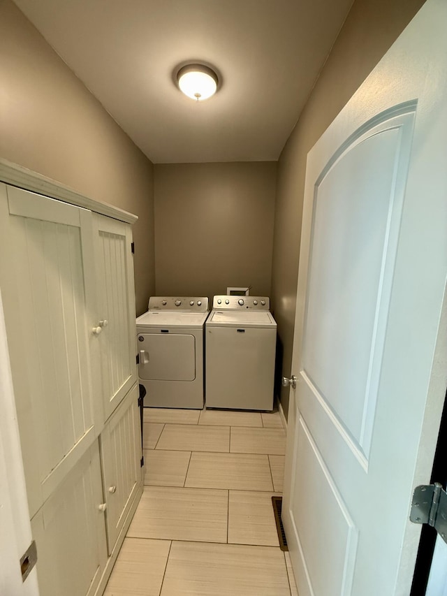 laundry area featuring separate washer and dryer