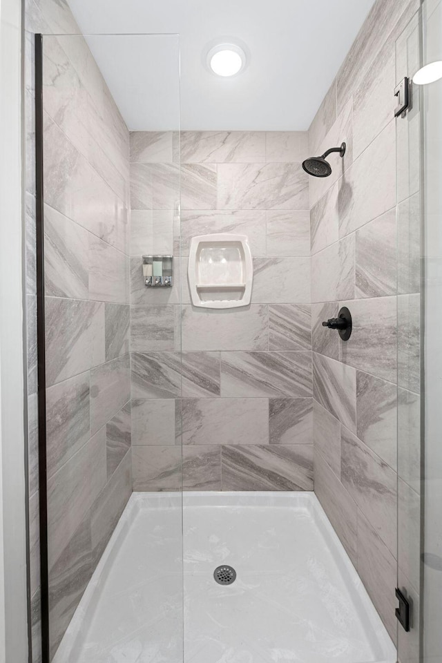 bathroom featuring a stall shower