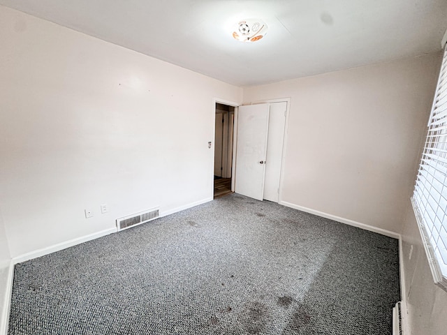 spare room with carpet