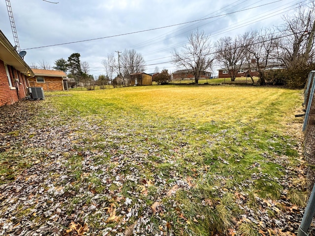 view of yard featuring central AC