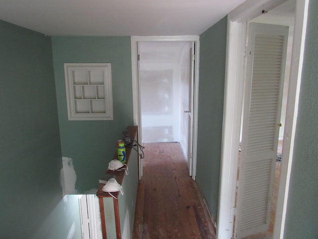 hallway with dark wood-type flooring