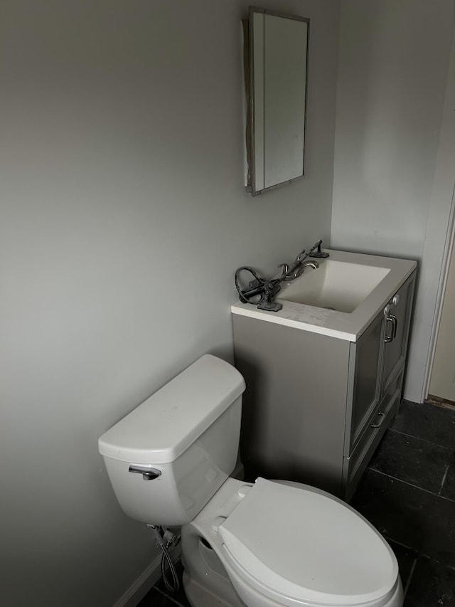 bathroom featuring sink and toilet