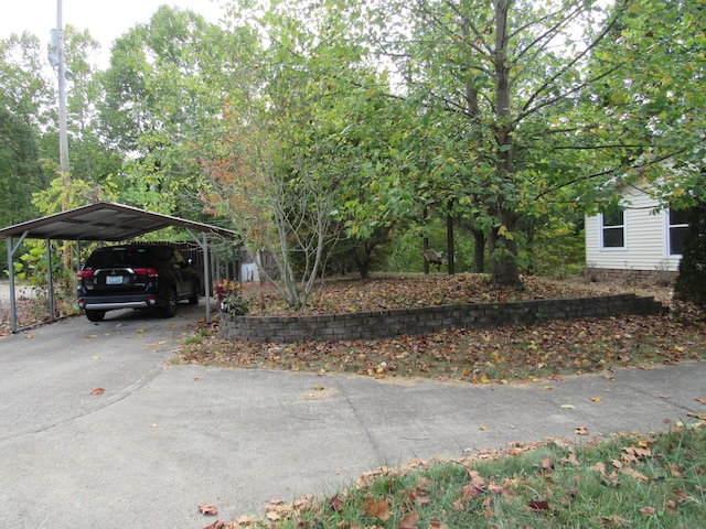 exterior space with a carport