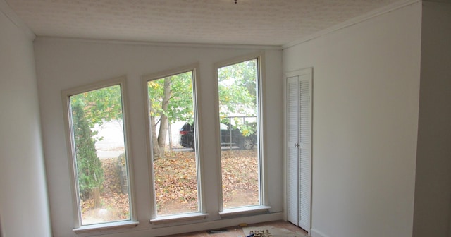 interior space featuring a textured ceiling