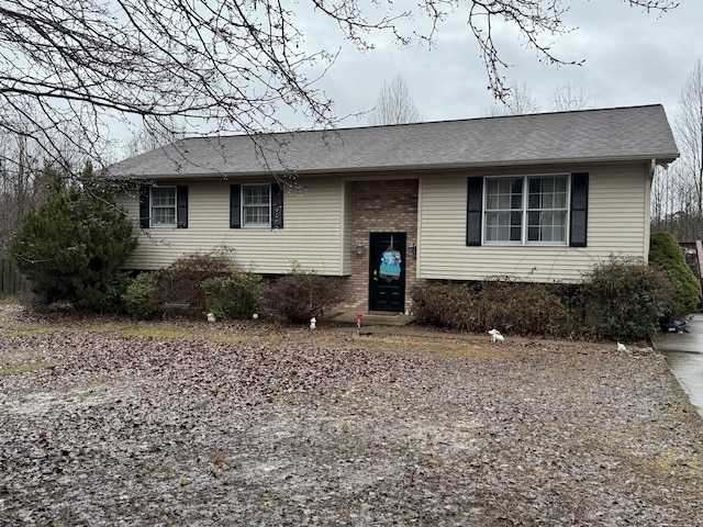 view of front of home featuring brick siding