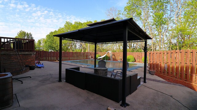 920 Meadow Ln, Harrodsburg, KY 40330 - view of patio featuring a gazebo, a fenced backyard, and a fenced in pool
