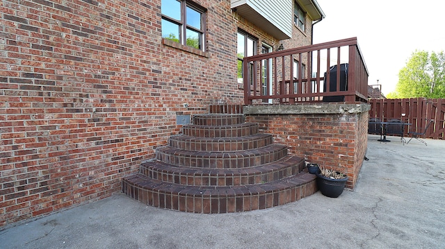 920 Meadow Ln, Harrodsburg, KY 40330 - exterior details with brick siding, stairway, and fence