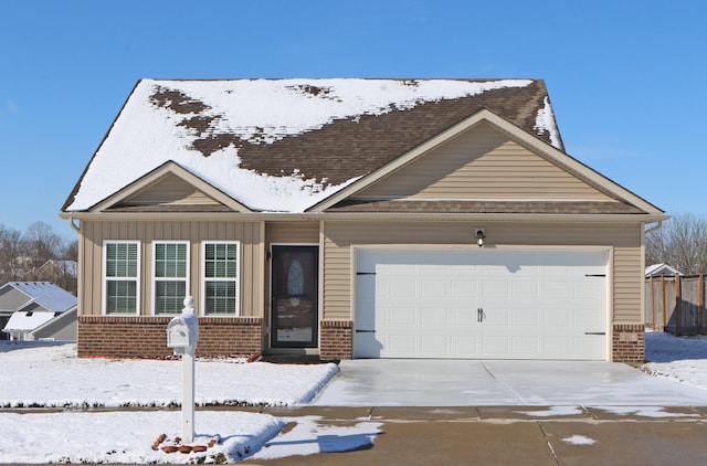 single story home featuring a garage