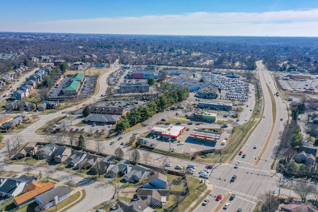 birds eye view of property with a residential view