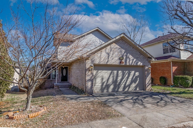 view of front of house with a garage, concrete driveway, and brick siding