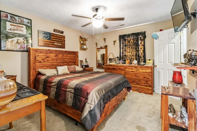 bedroom featuring ceiling fan and carpet flooring