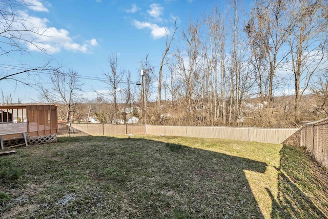 view of yard with a deck