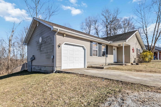 exterior space featuring a garage and a front yard