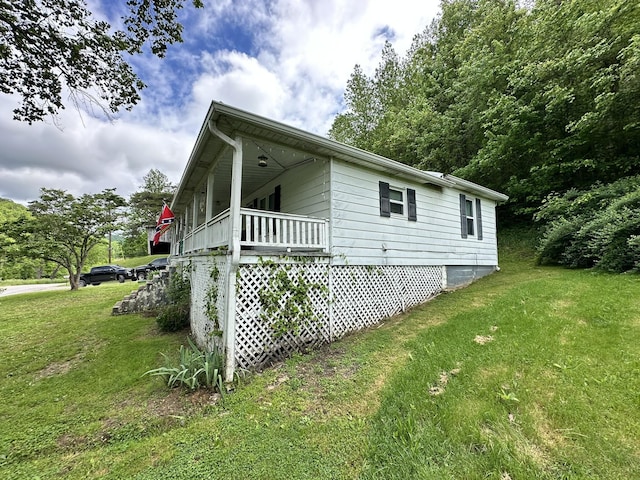 view of property exterior featuring a yard