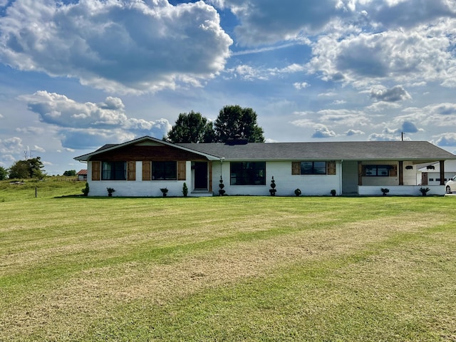 ranch-style house with a front yard