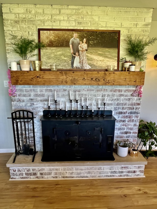 details featuring baseboards and wood finished floors