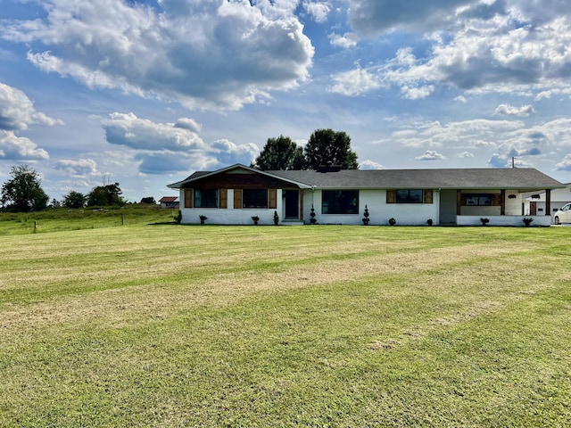 ranch-style house with a front yard