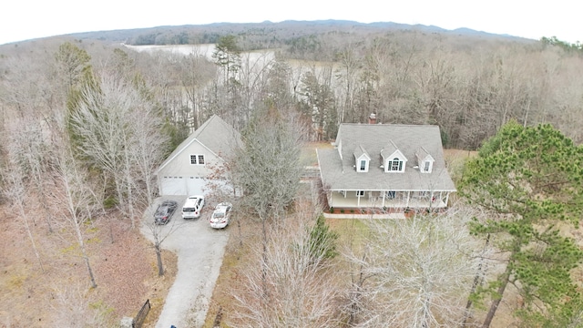 aerial view with a wooded view