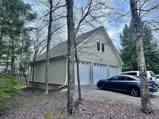 garage with driveway