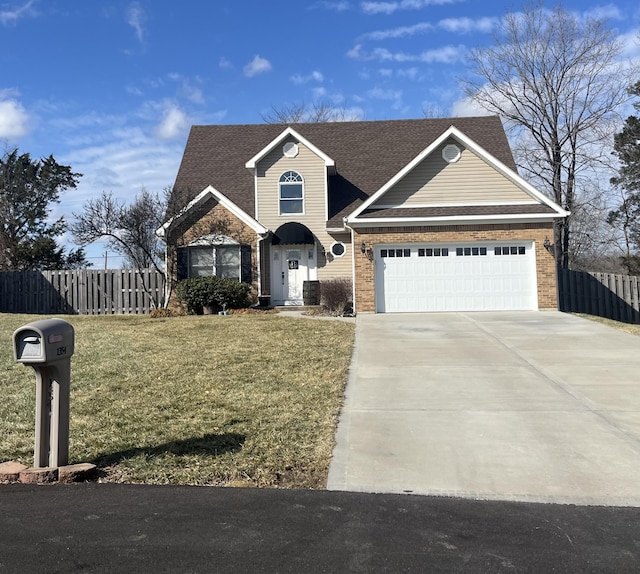 view of front of property featuring a front yard and a garage