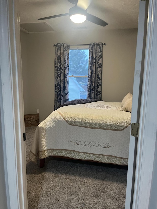 bedroom featuring ceiling fan and carpet floors