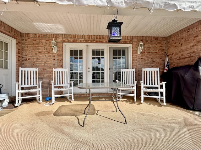 view of patio with french doors and area for grilling