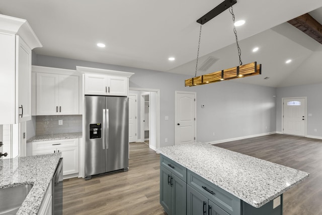 204 Max Cavnes Rd, Danville, KY 40422 - kitchen featuring lofted ceiling, light wood-style flooring, stainless steel appliances, white cabinetry, and backsplash